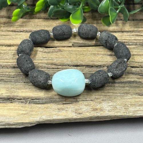 Discover the Lava Bead Bracelet with Aquamarine Centerpiece – A Stunning Accessory for Just $9.99 - VAEL Designs