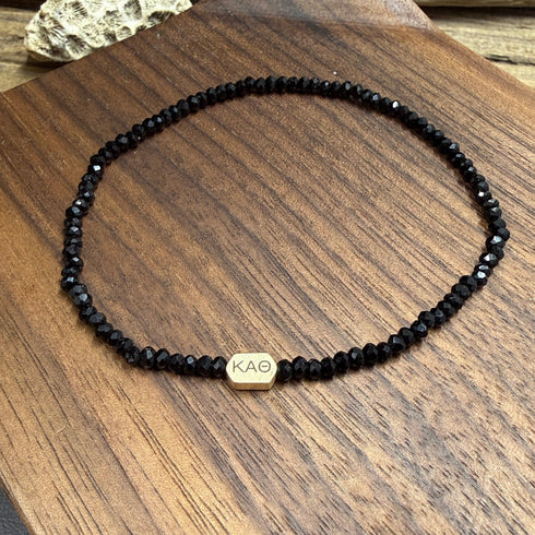 Petite Black Spinel Bracelet with Engraved Accent Bead Bracelets
