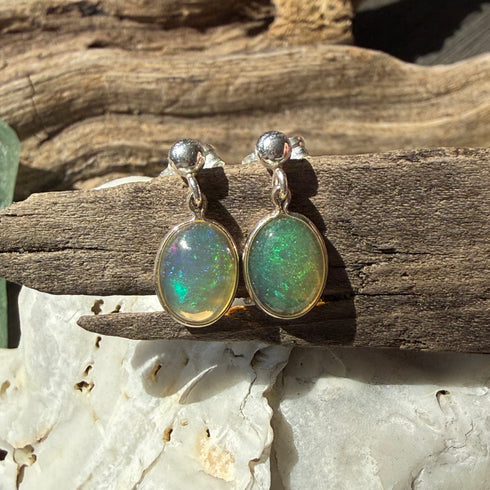 Ethiopian Welo Opal Stud Earrings in Sterling Silver – 8x10mm Oval with Play of Color Earrings