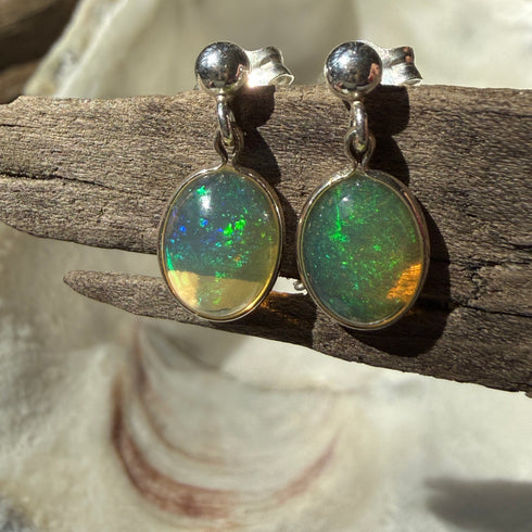 Ethiopian Welo Opal Stud Earrings in Sterling Silver – 8x10mm Oval with Play of Color Earrings