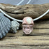 Cantera Mexican Opal Skull Necklace on White Leather Necklaces