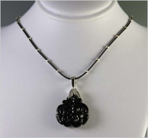 Carved Onyx Focal on Rubber and Sterling Necklace Necklaces
